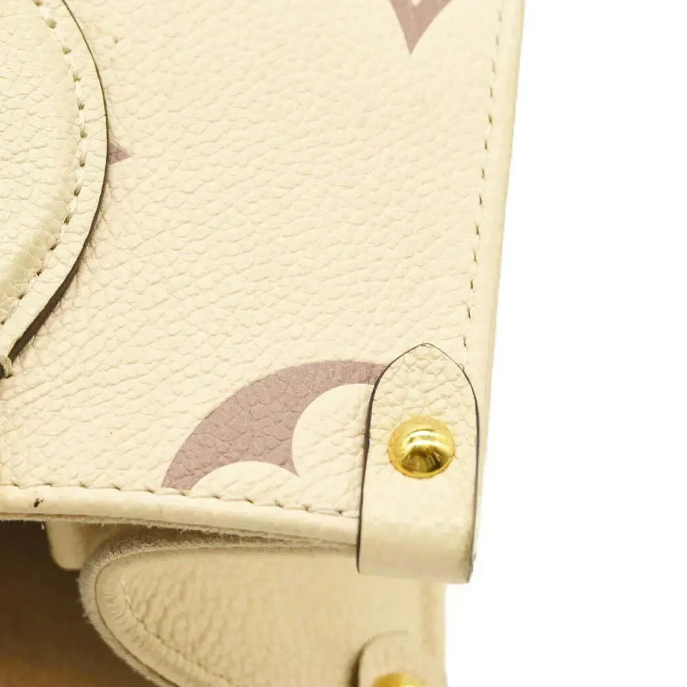 Louis Vuitton  Empreinte Monogram Giant Onthego PM Creme